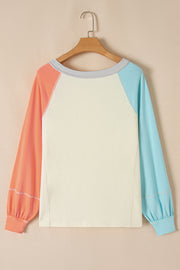 Cotton blend colorblock long sleeve top, close-up detail