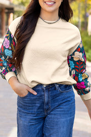 Drop shoulder floral sleeve top with soft shift fit