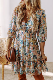 Shirred floral dress with flattering V-neckline for daily wear