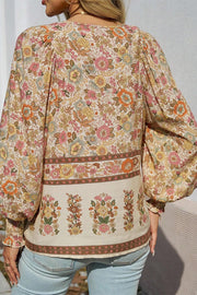 Floral lantern sleeve blouse with shirred long sleeves