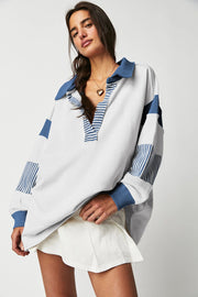 Black striped sweatshirt with standout patchwork collar and stripe mix