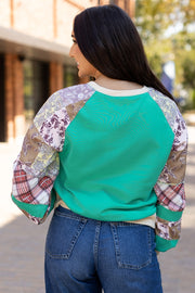 Vintage patchwork long sleeve top showing contrast neckline color-block detail