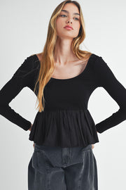 Long sleeve ribbed knit peplum top in stretchy textured fabric