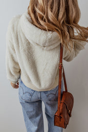 Plush white hoodie showing contrast ribbed edge structured silhouette