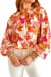 Long puff sleeves on lightweight viscose floral blouse