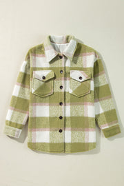 Roomy sage green plaid shacket layered over a tee for casual daytime style