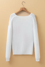 White Pearl Heart V-Neck Sweater close-up on pearl beading