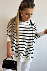 Striped loose-fit sweatshirt showing side slit detail