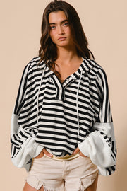 Long dolman sleeve striped hooded top styled for casual daily wear