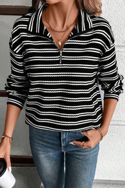 Striped long sleeve top with quarter zip collar for adjustable coverage