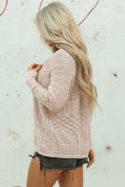 Casual knit cardigan detail highlighting medium-high stretch texture