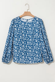 Blue floral lantern sleeve blouse in relaxed shift fit