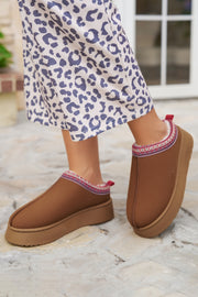 Chestnut snow boots styled for casual daily wear