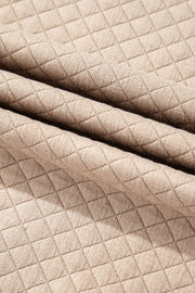 Drop shoulder quilted top in soft parchment fabric
