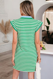 Back view of a woman wearing a green and white striped short dress with a light blue contrast collar and flutter sleeves