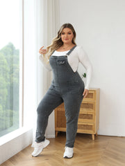 Medium wash denim jumpsuit with worn-in vintage look, versatile year-round style