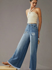 Maanga micro-flare denim showing the subtle flared leg
