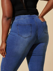 Full length pencil-style blue denim jeans, plus size