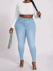 Light blue skinny jeans showing zipper fly and button closure by Maanga