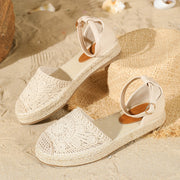 White flat fisherman sandals with breathable mesh upper
