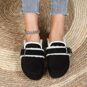 Warm women's slippers featuring subtle buckle accent detail
