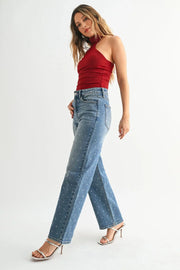 Light wash denim wide leg jeans with flowing full-length cut