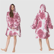 Oversized one-size wearable blanket hoodie draped in relaxed fit