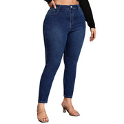 High waist skinny jeans tapering cleanly to the ankle