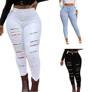 High waist skinny jeans for plus size women in medium-wash stretch denim