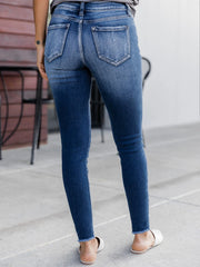 High-waist light blue jeans with flattering elongated silhouette