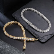 18K white gold plated tennis bracelet with clean, continuous line of CZ