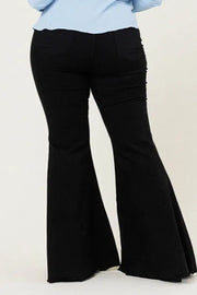 Mid-rise boot cut jeans in medium bleach stone wash denim