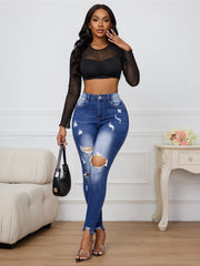 Ripped skinny jeans in polyester-cotton blend for year-round wear
