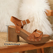 Slide-style wedge heel sandals with secure buckle strap