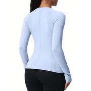 Long sleeve gym shirt with thumbholes for wrist coverage