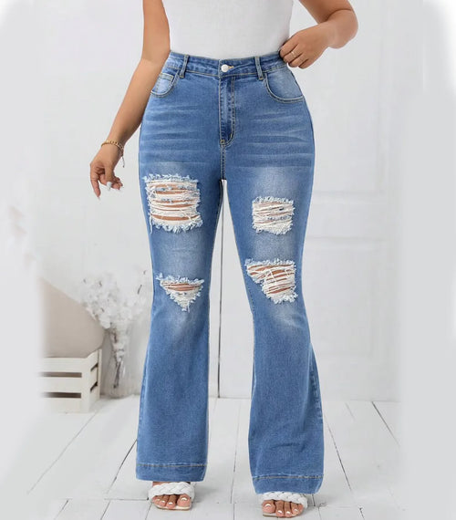 Plus size light blue wide leg flare jeans with ripped details