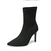 Slip-on ankle sock boots with clean solid finish and 9cm heel
