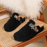 Black embroidered slip-on vacation mules