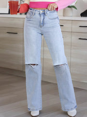 Maanga flared jeans in light blue washed denim, mid-waist loose cut
