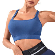 Sleeveless racerback sports bra with sewn-in pads