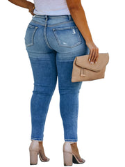 Light Blue Ripped Jeans with subtle ripped detailing and bleach wash