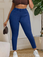Mid-rise black skinny jeans with stretch waistband