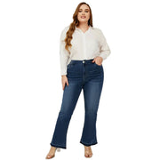 Dark blue flare jeans showing wide leg-lengthening flare leg