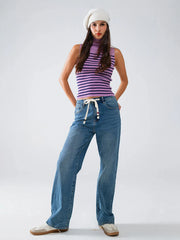 High-waist wide-leg denim pants styled for casual or dressed-up looks