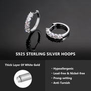 VVS moissanite huggie hoops with round brilliant-cut stones and claw setting