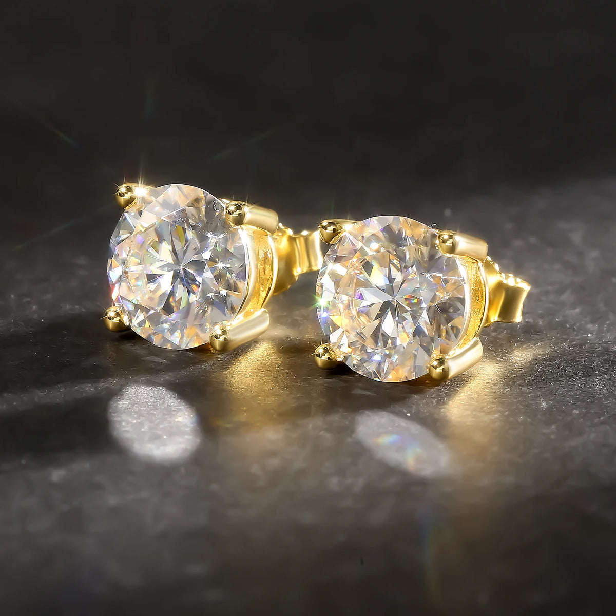 Moissanite stud earrings in 925 sterling silver with round brilliant-cut stones