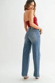 Plus size rhinestone jeans styled with a crisp blouse