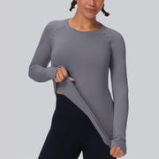 Women's seamless long-sleeve workout top with thumb holes and crew neck