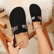 Embroidered mules with platform sole for summer