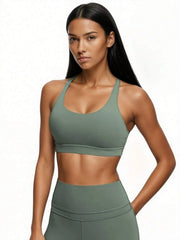 Scoop neck sports bra with open range of motion crisscross straps